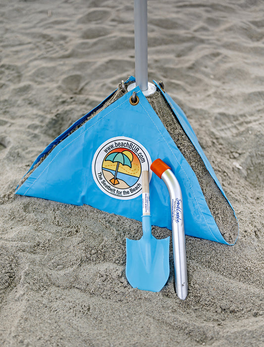 man using beach sand gopher to dig a sole for a beach umbrella