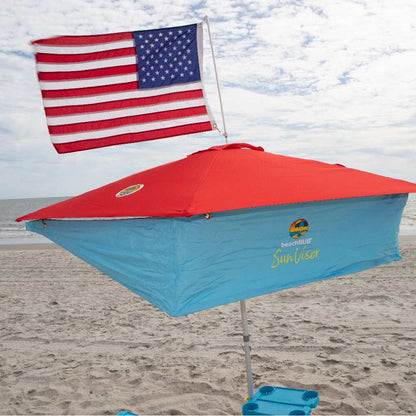 red beach umbrella with sun shade addon and american flag